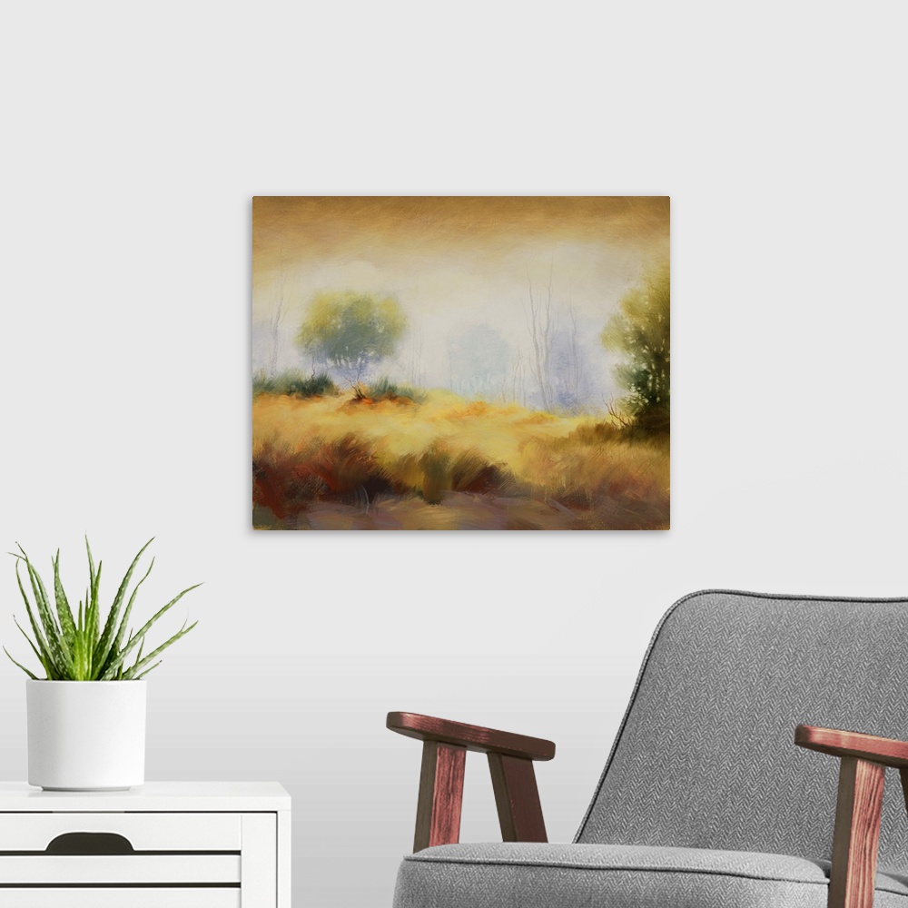 A modern room featuring Contemporary painting of a misty meadow with trees along the edge.