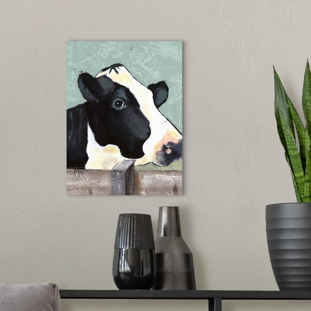 A modern room featuring Contemporary portrait of a black and white dairy cow with a sweet expression.