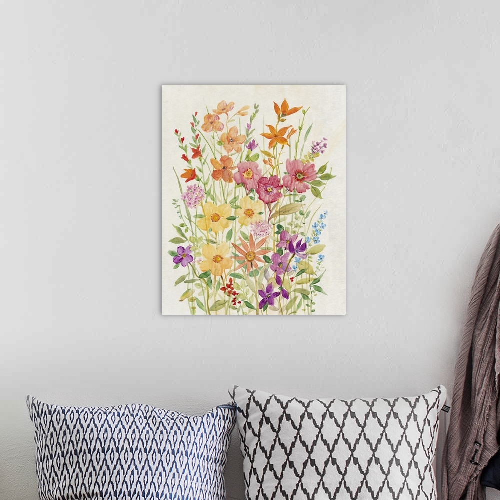 A bohemian room featuring A charming painting of  vibrant, warm colored wild flowers in a summer garden.