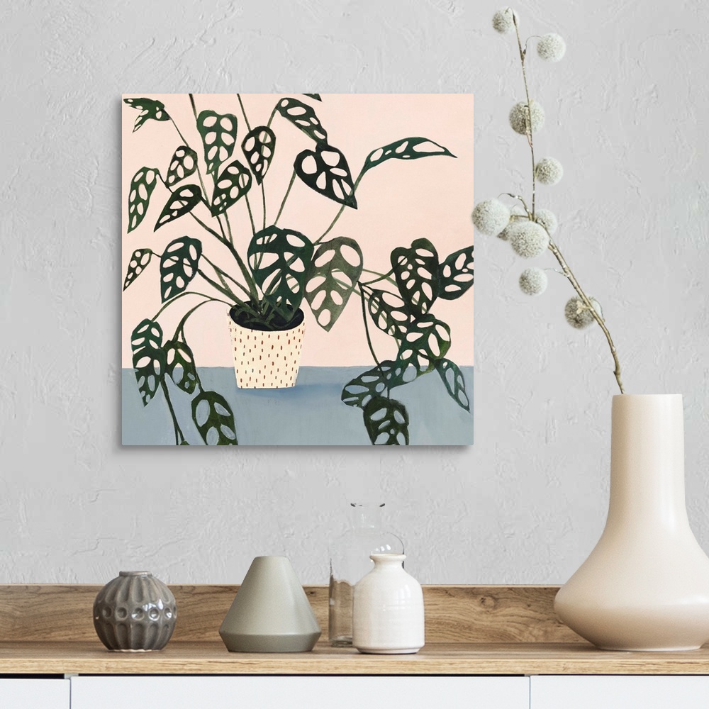 A farmhouse room featuring Modern painting of a leafy houseplant in a cream colored pot with spots on a muted blue and cream...