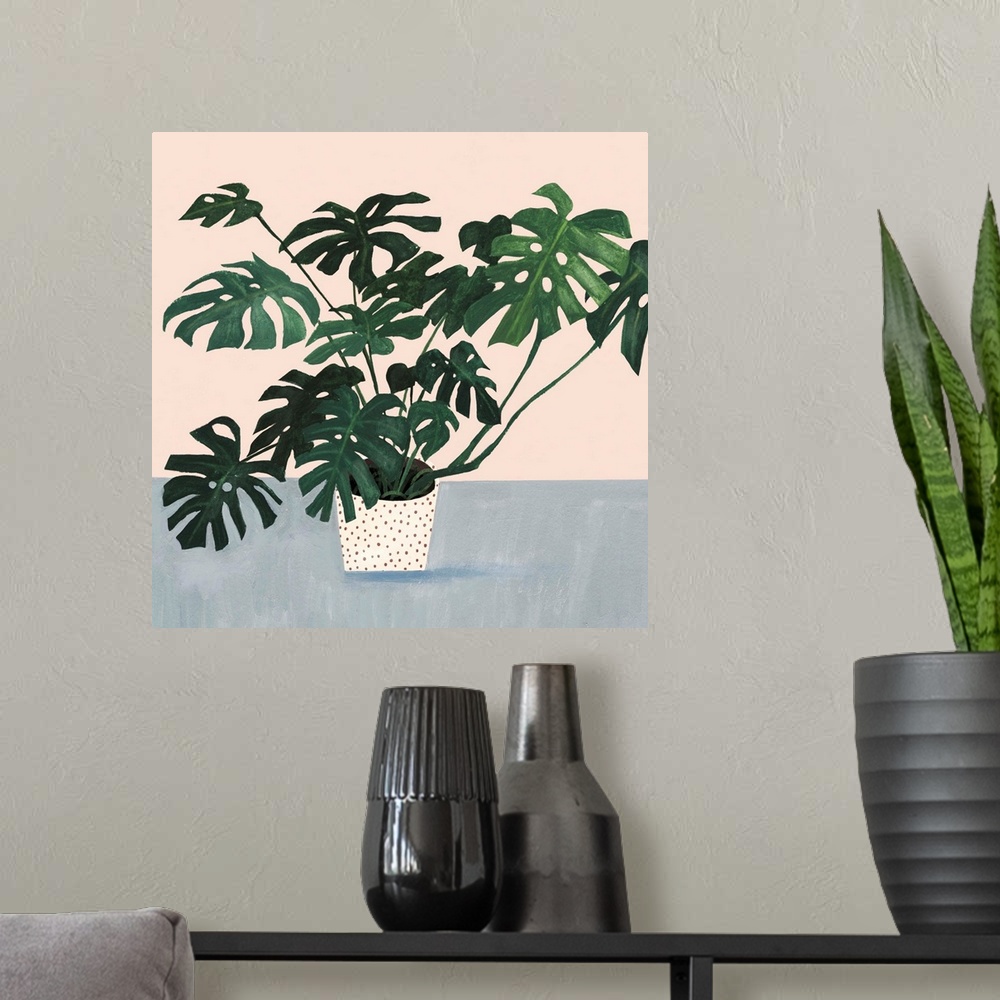 A modern room featuring Modern painting of a leafy houseplant in a cream colored pot with spots on a muted blue and cream...