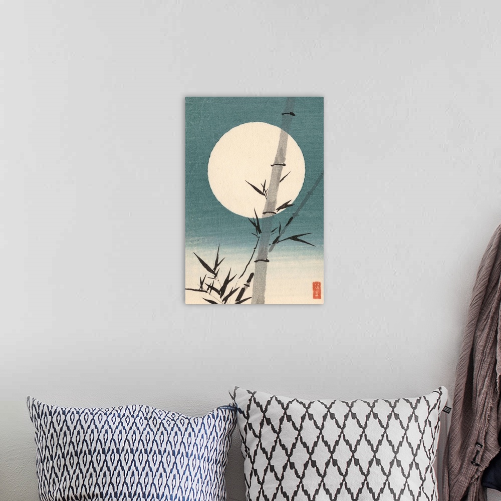 A bohemian room featuring Eastern art of a bamboo culm against the moon.
