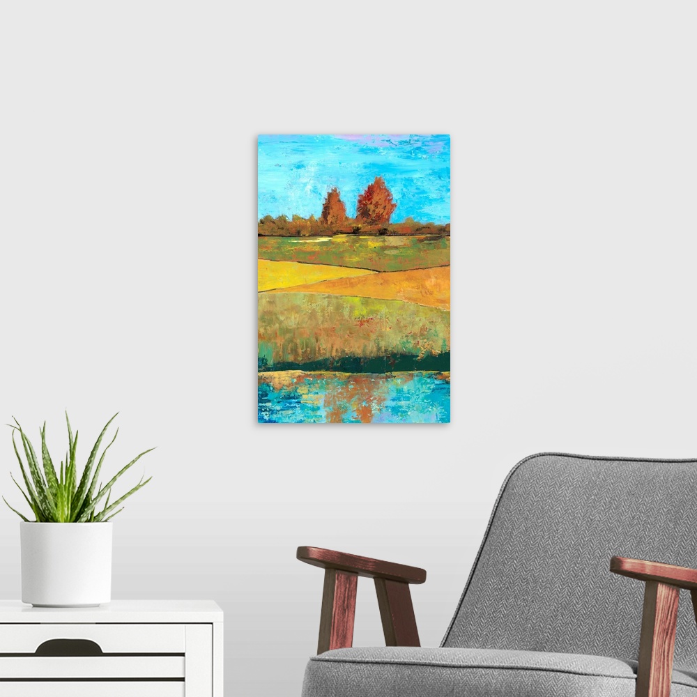 A modern room featuring Contemporary painting of a countryside landscape with green fields.