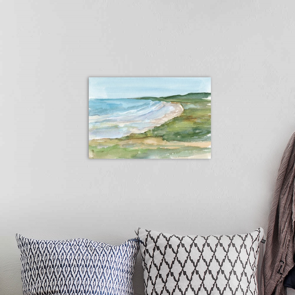 A bohemian room featuring Semi-abstract watercolor painting of a coastal landscape.