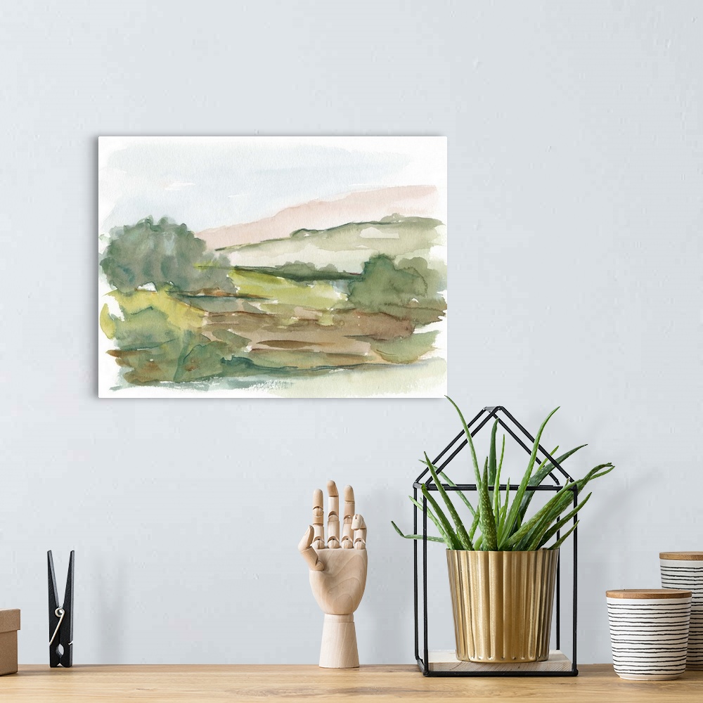 A bohemian room featuring Semi-abstract watercolor painting of a green meadow.