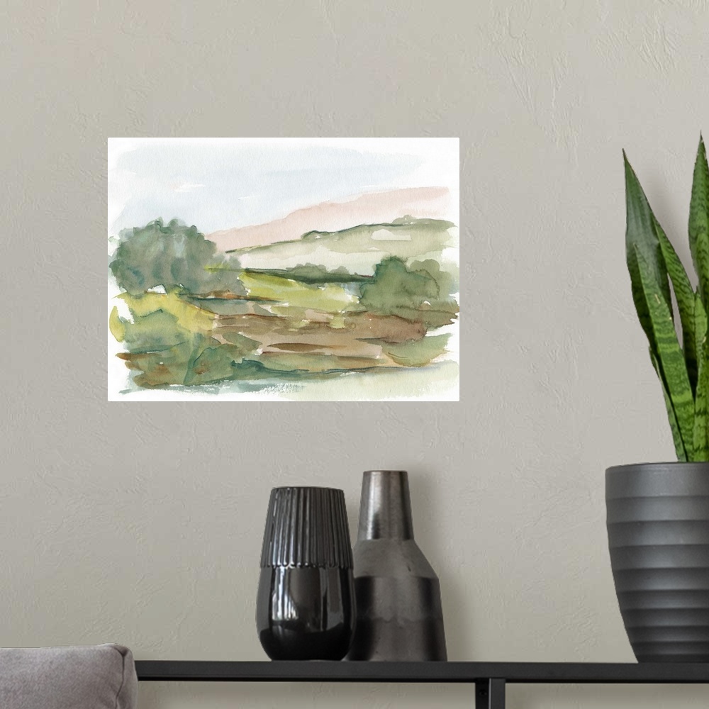 A modern room featuring Semi-abstract watercolor painting of a green meadow.