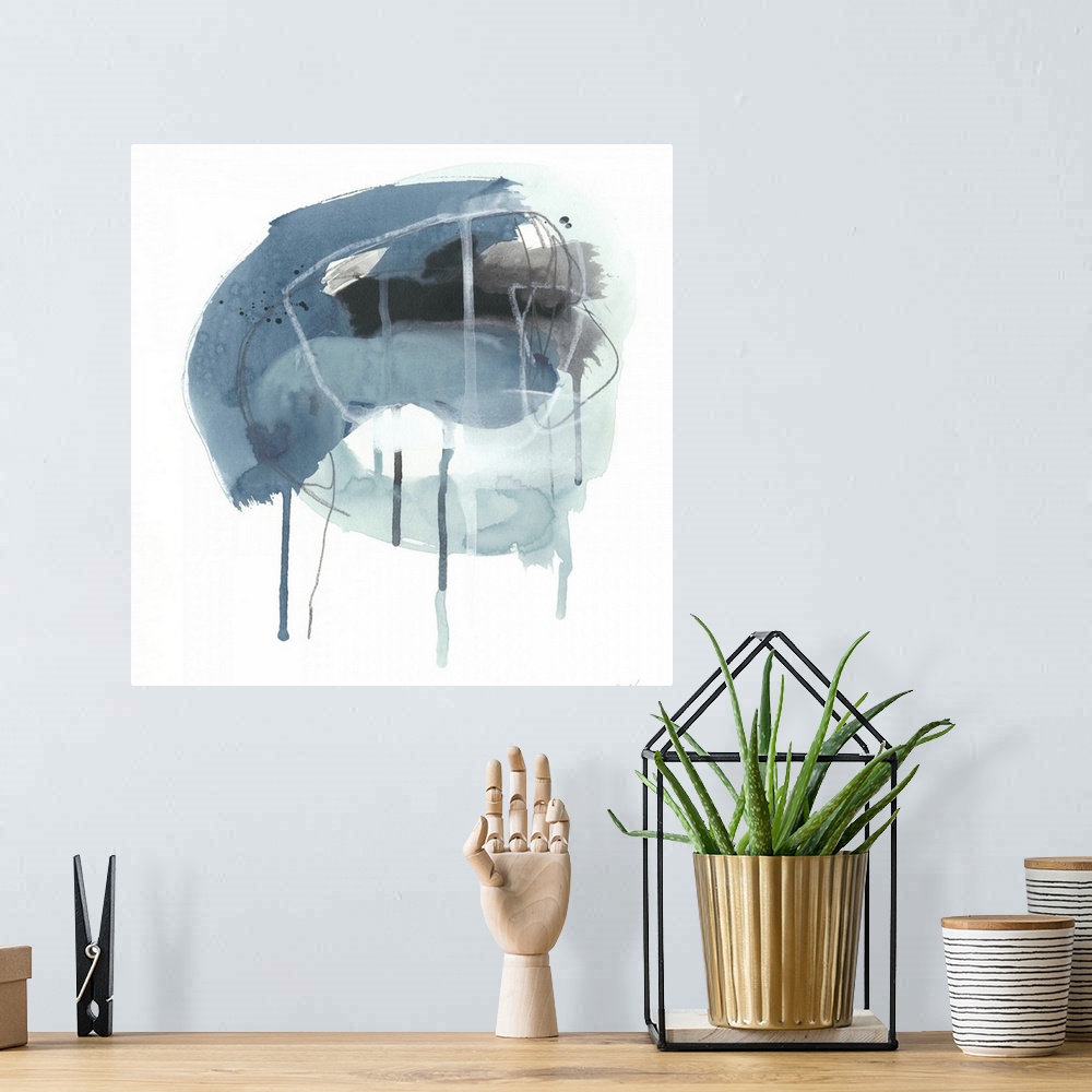 A bohemian room featuring Square abstract painting in black, blue and white with drips of the overlapping paint on a white ...