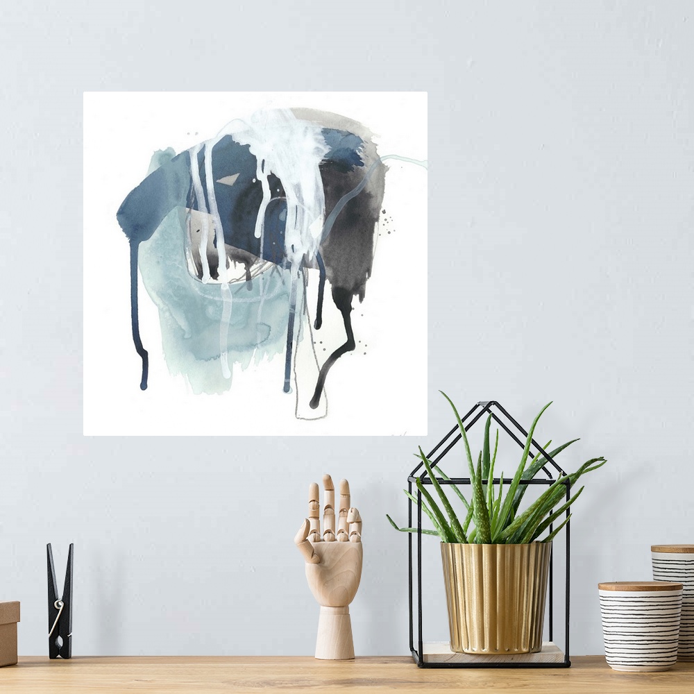 A bohemian room featuring Square abstract painting in black, blue and white with drips of the overlapping paint on a white ...