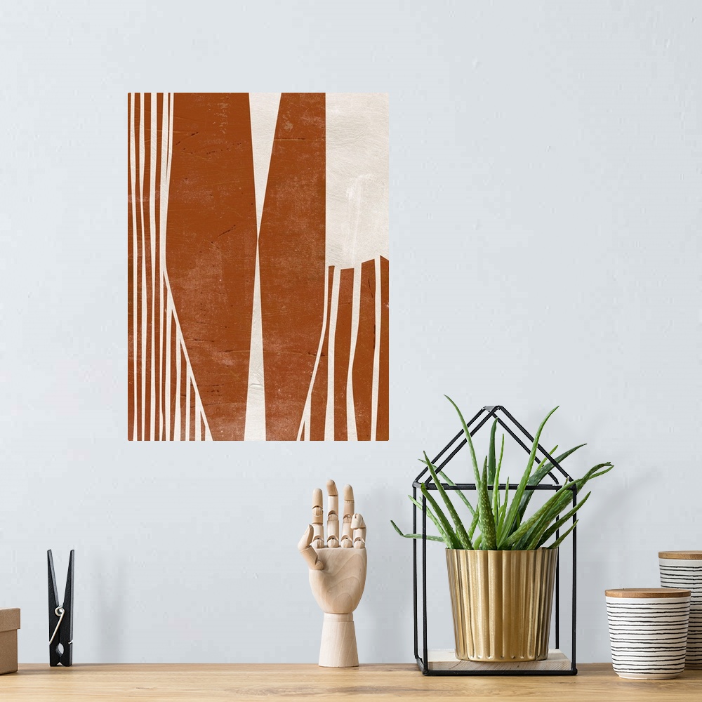 A bohemian room featuring An earthy, chunky geometric abstract in warm earth tones.