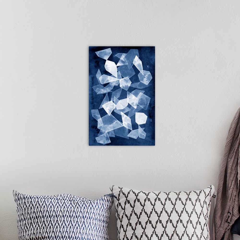 A bohemian room featuring This contemporary artwork features white geometric shapes that resemble falling shards of glass o...