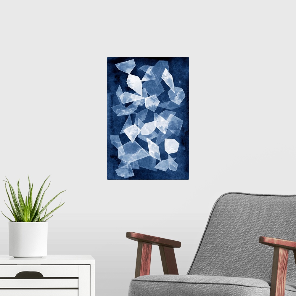 A modern room featuring This contemporary artwork features white geometric shapes that resemble falling shards of glass o...
