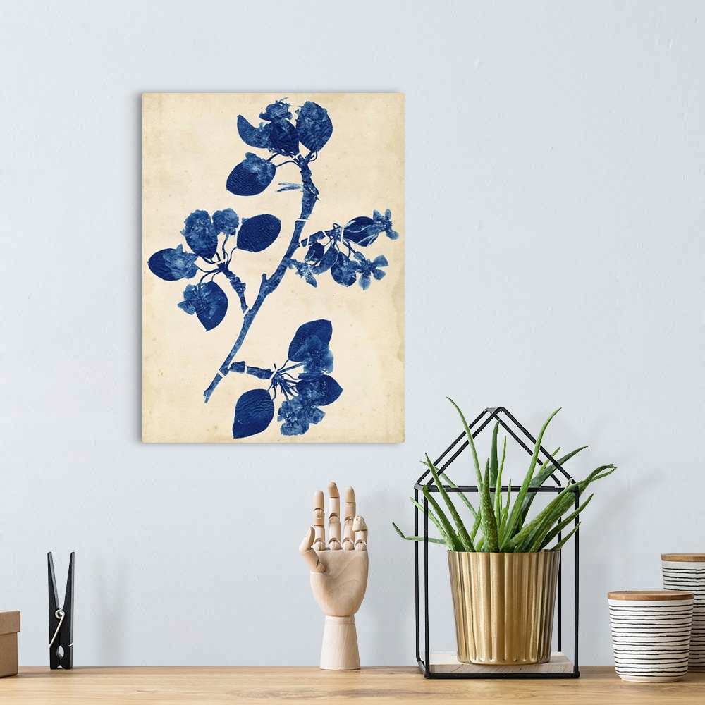 A bohemian room featuring Contemporary artwork of blue flowers against a weathered beige background.