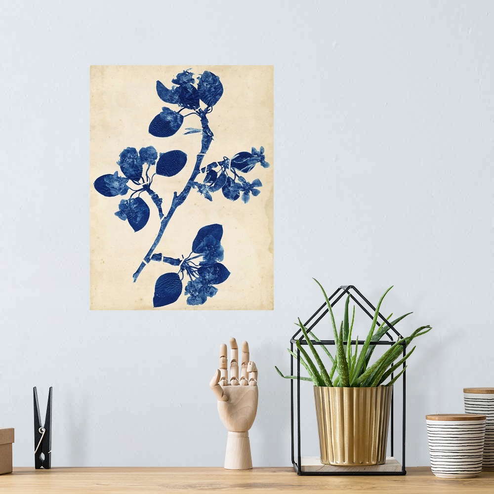 A bohemian room featuring Contemporary artwork of blue flowers against a weathered beige background.