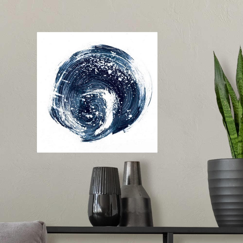 A modern room featuring Contemporary abstract painting of a circular nebula shape in a dark indigo blue against a white b...