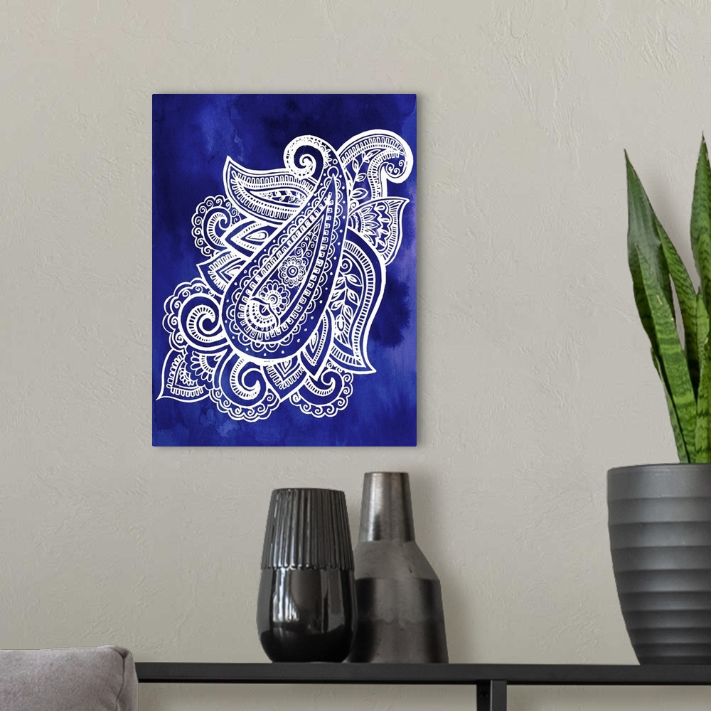 A modern room featuring Artistic design of a large paisley pattern in white on an indigo blue backdrop.