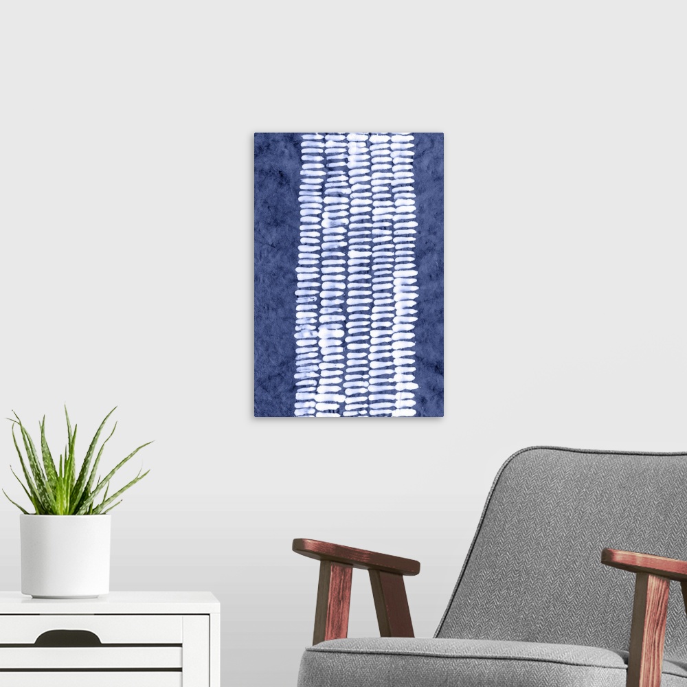 A modern room featuring White geometric pattern in a vertical column on a blue wash background.