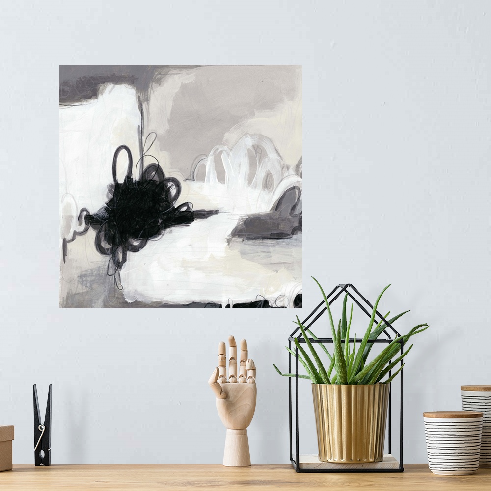 A bohemian room featuring Abstract painting in black and white shades.