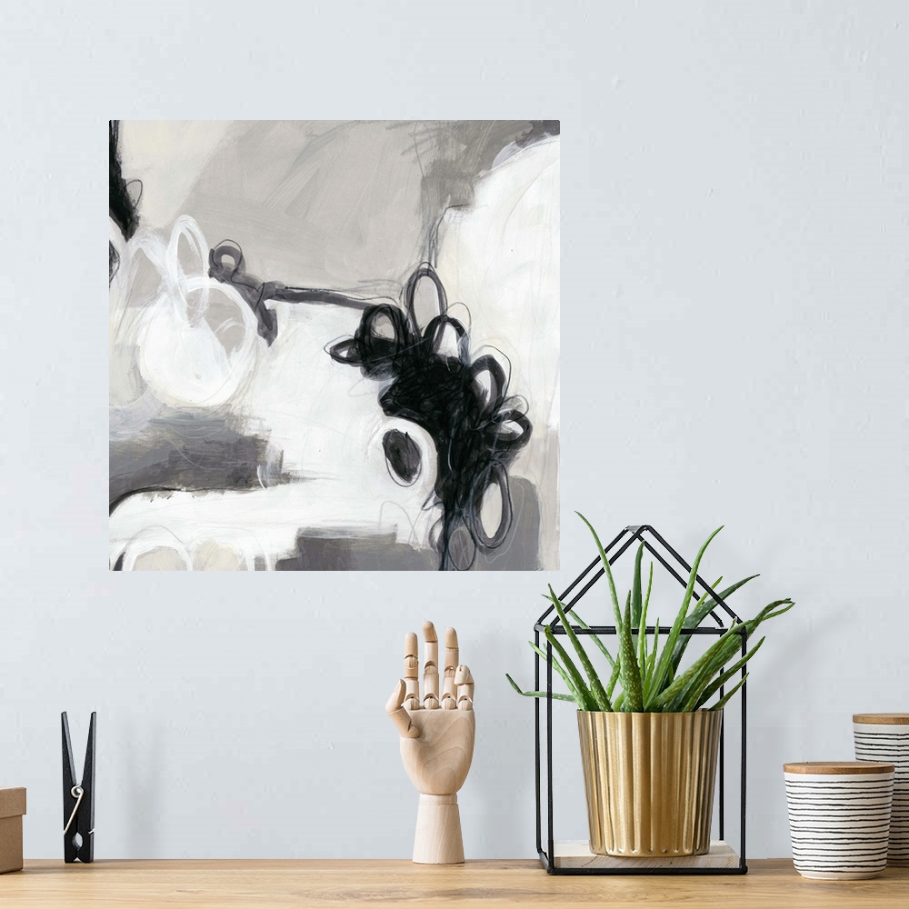 A bohemian room featuring Abstract painting in black and white shades.
