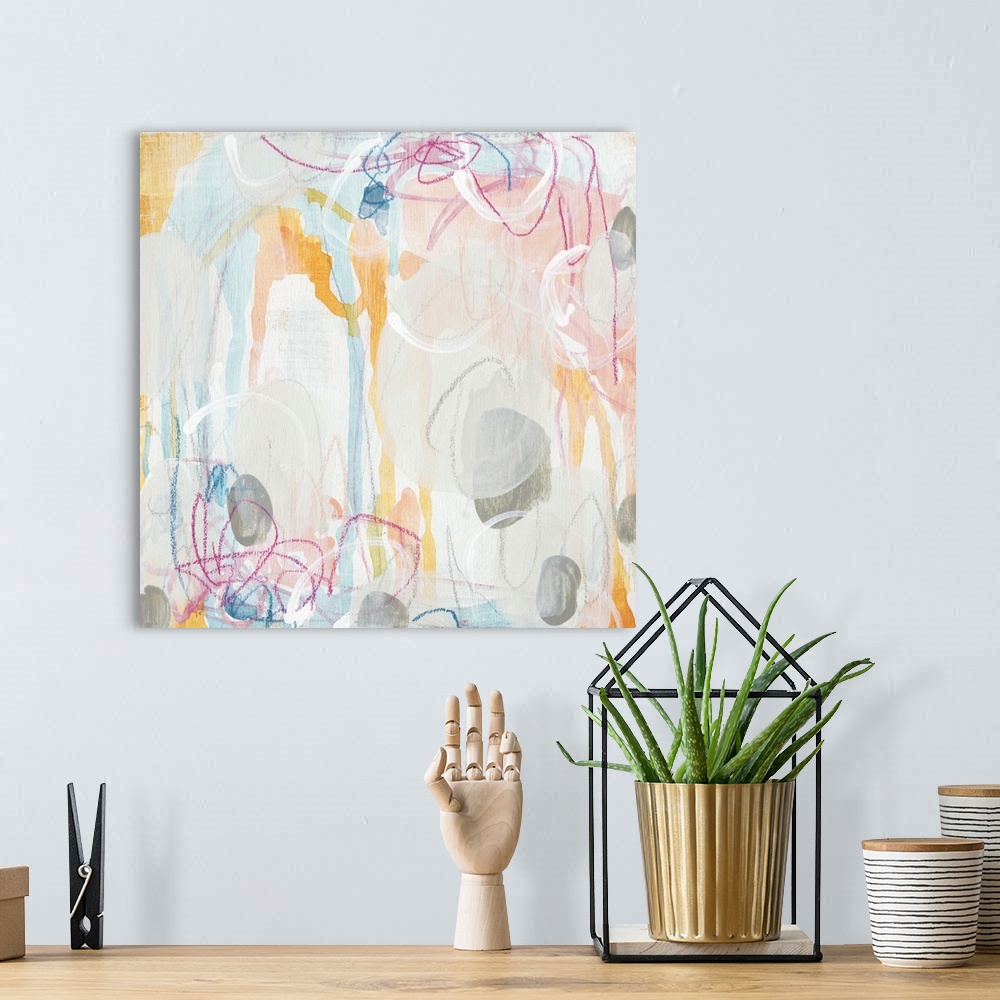 A bohemian room featuring Square abstract painting in light pastel colors with drips of the overlapping paint and colored s...