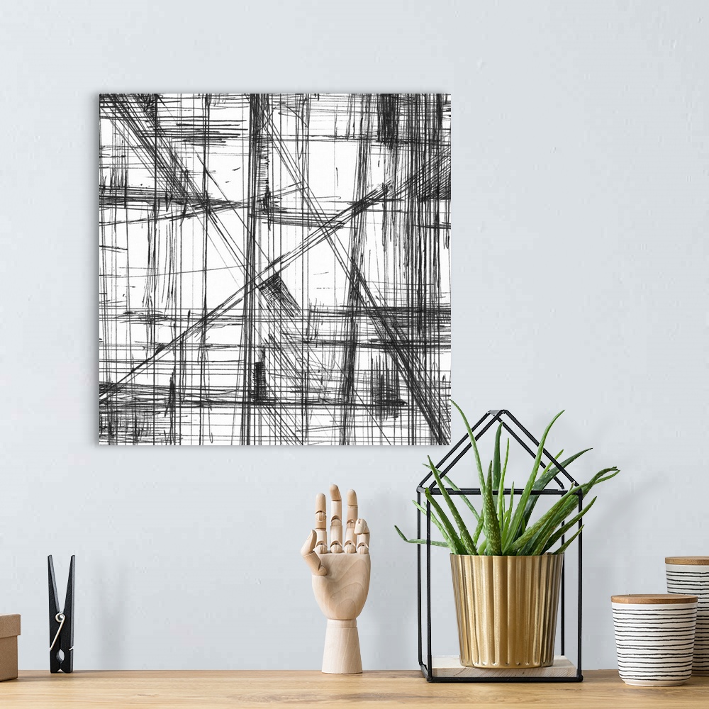 A bohemian room featuring Contemporary abstract artwork of web-like lines running all over the image against a white surface.
