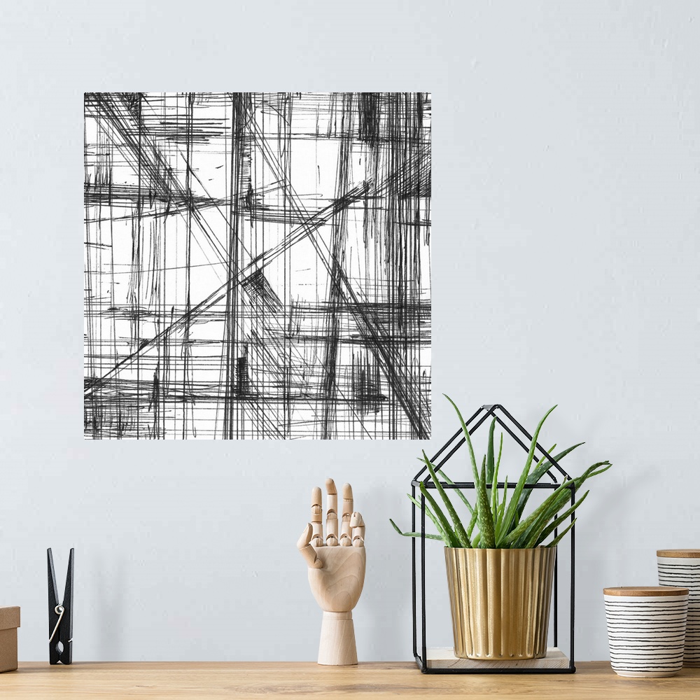 A bohemian room featuring Contemporary abstract artwork of web-like lines running all over the image against a white surface.