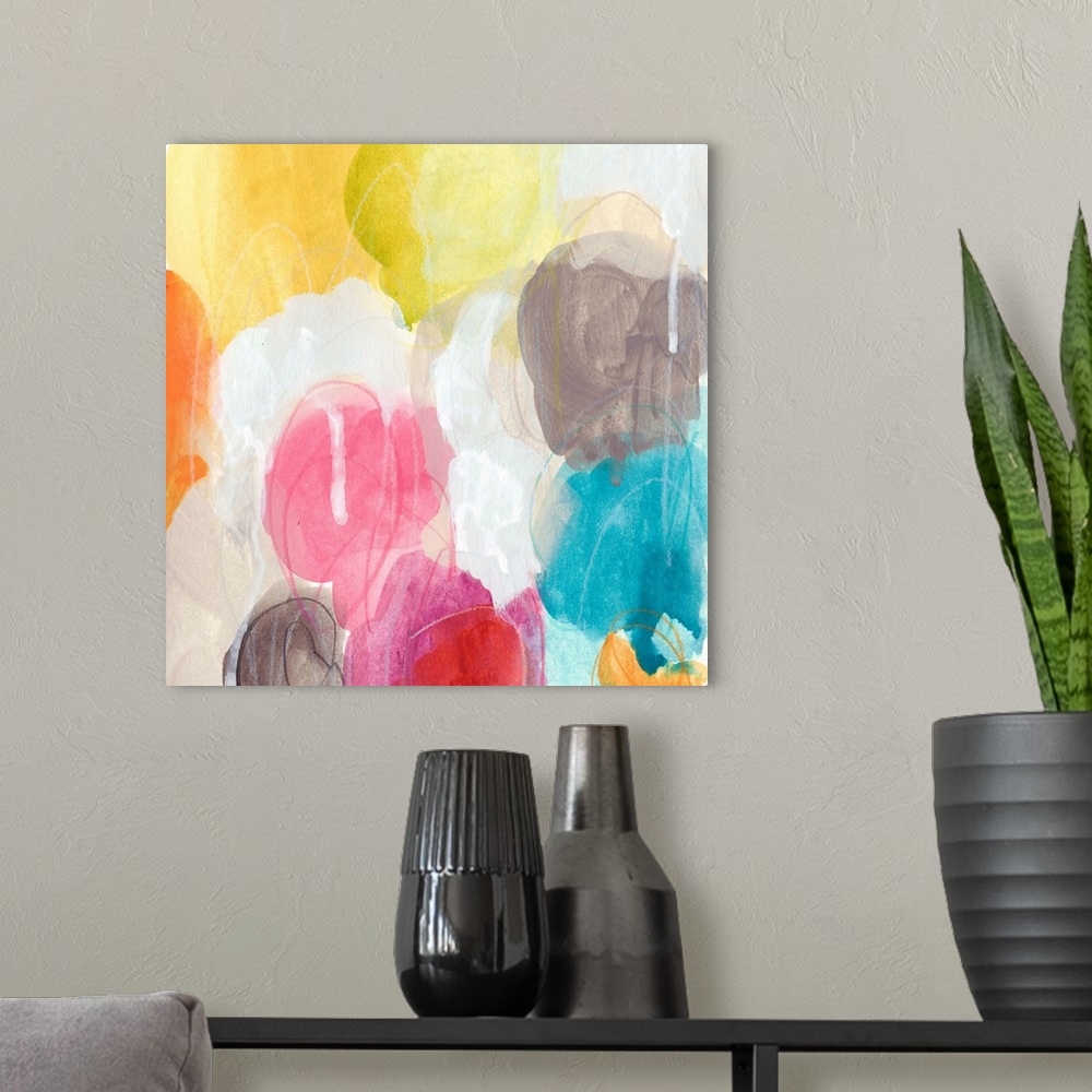 A modern room featuring Colorful contemporary abstract artwork using globular shapes overlapping one another.