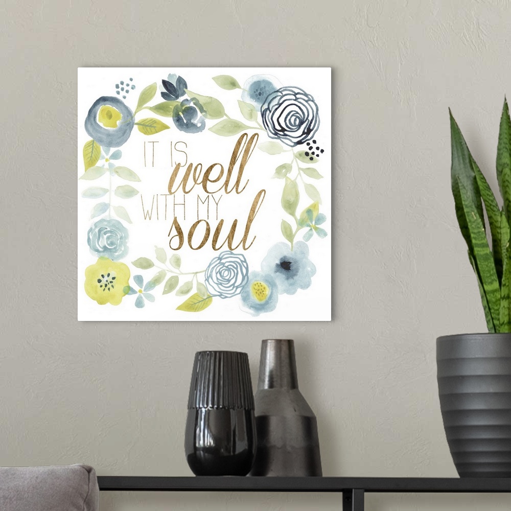 A modern room featuring A wreath of watercolor flowers outlines the phrase: It is well with my soul.