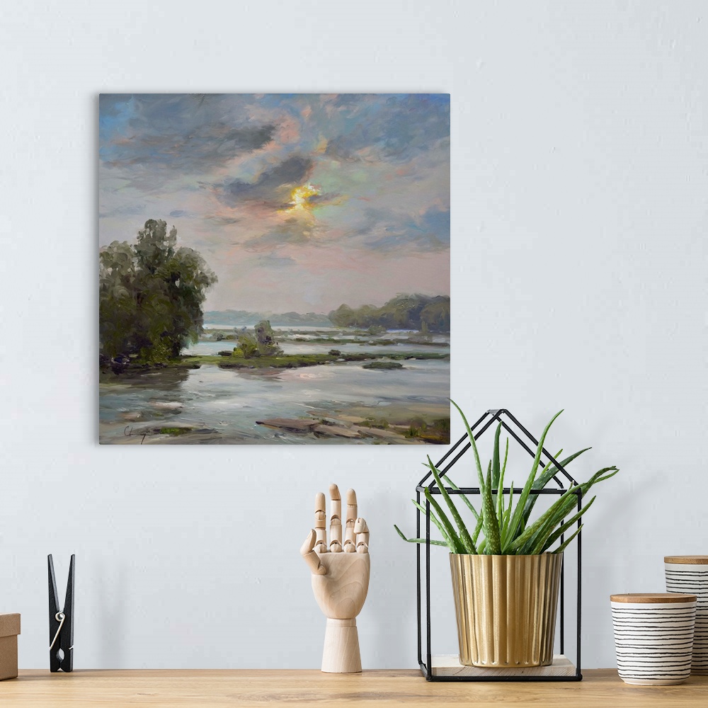 A bohemian room featuring Contemporary painting of a river landscape under a pale sky.