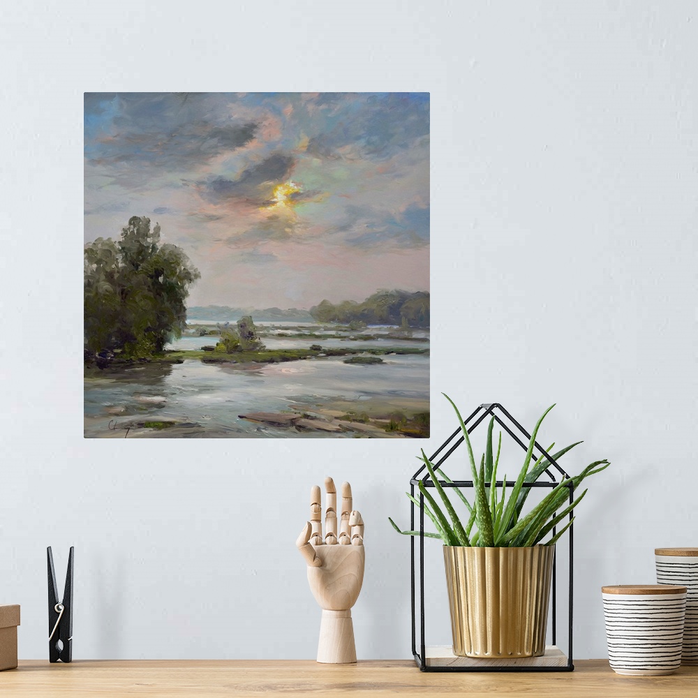 A bohemian room featuring Contemporary painting of a river landscape under a pale sky.