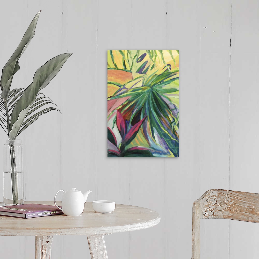 A farmhouse room featuring Tropical painting of bright green palm leaves and red flowers.