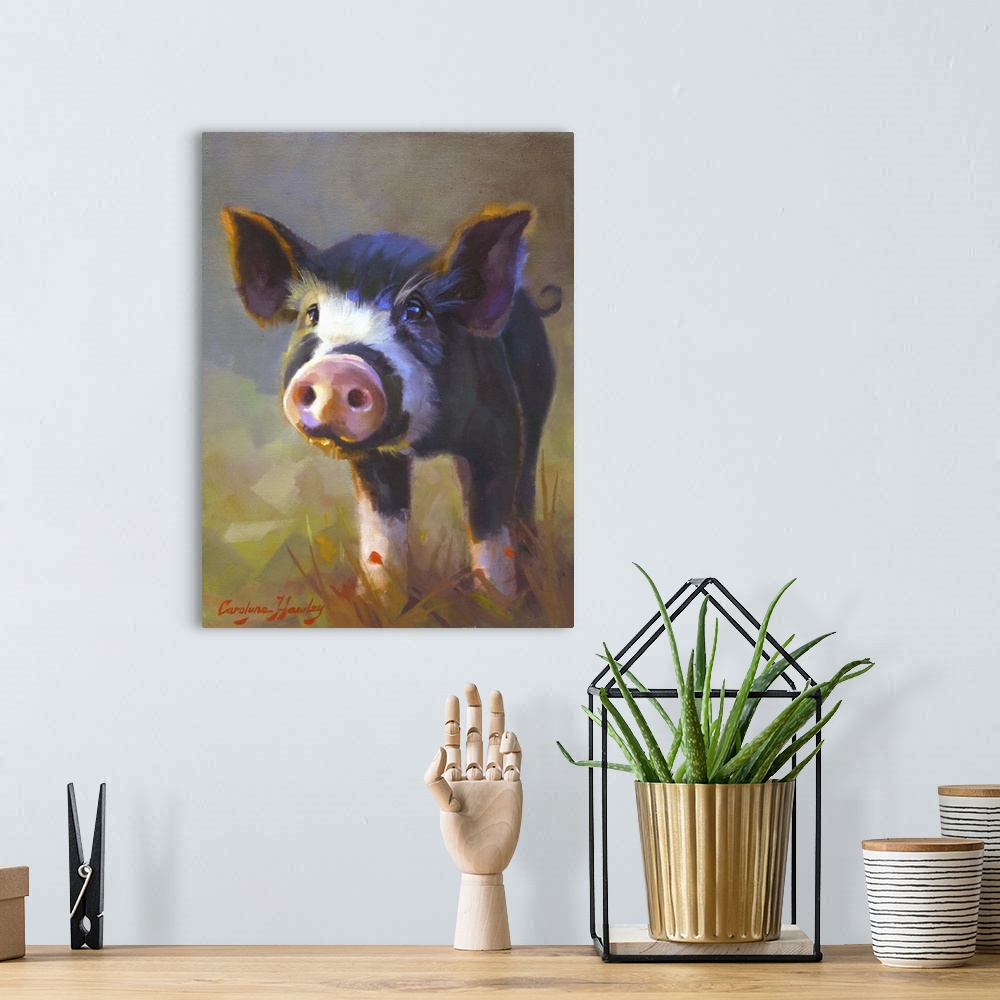 A bohemian room featuring Contemporary artwork of a cute black and white pig with a big pink nose.
