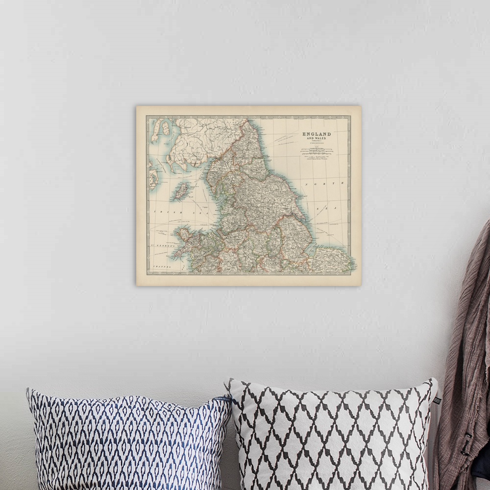 A bohemian room featuring Vintage map of the countries of England and Wales.