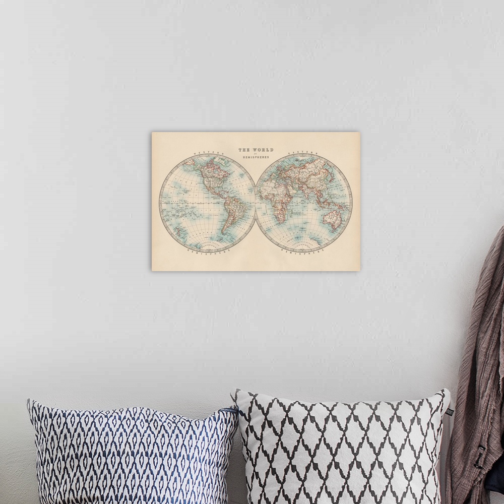 A bohemian room featuring Vintage map of the world divided in to eastern and western hemispheres.