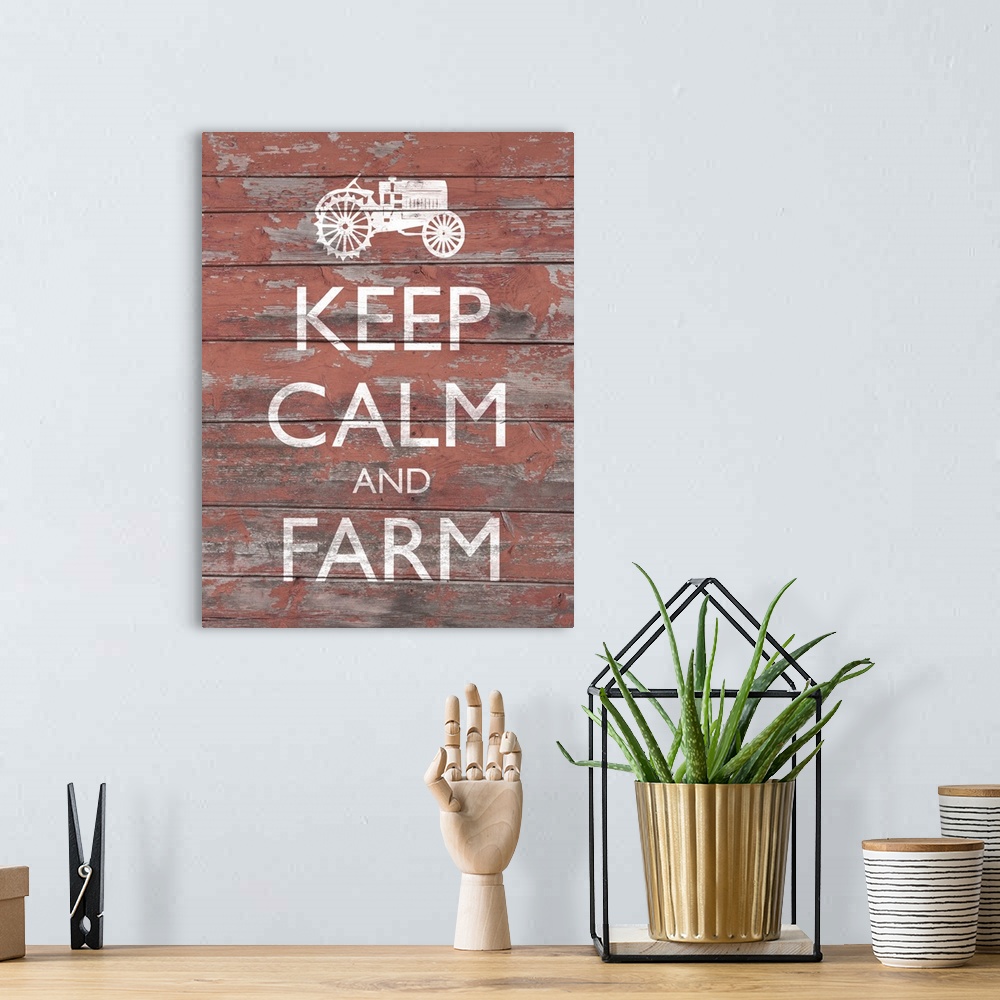 A bohemian room featuring "Keep Calm And Farm" written on a distressed red wooden background with an illustration of a trac...