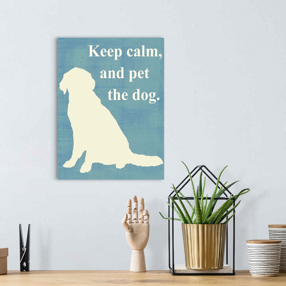 A bohemian room featuring Keep calm and pet the dog