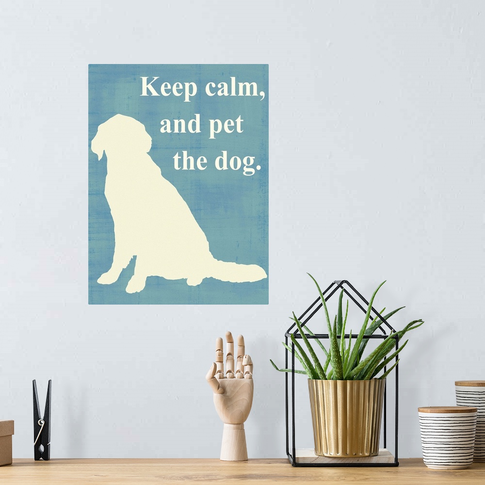 A bohemian room featuring Keep calm and pet the dog