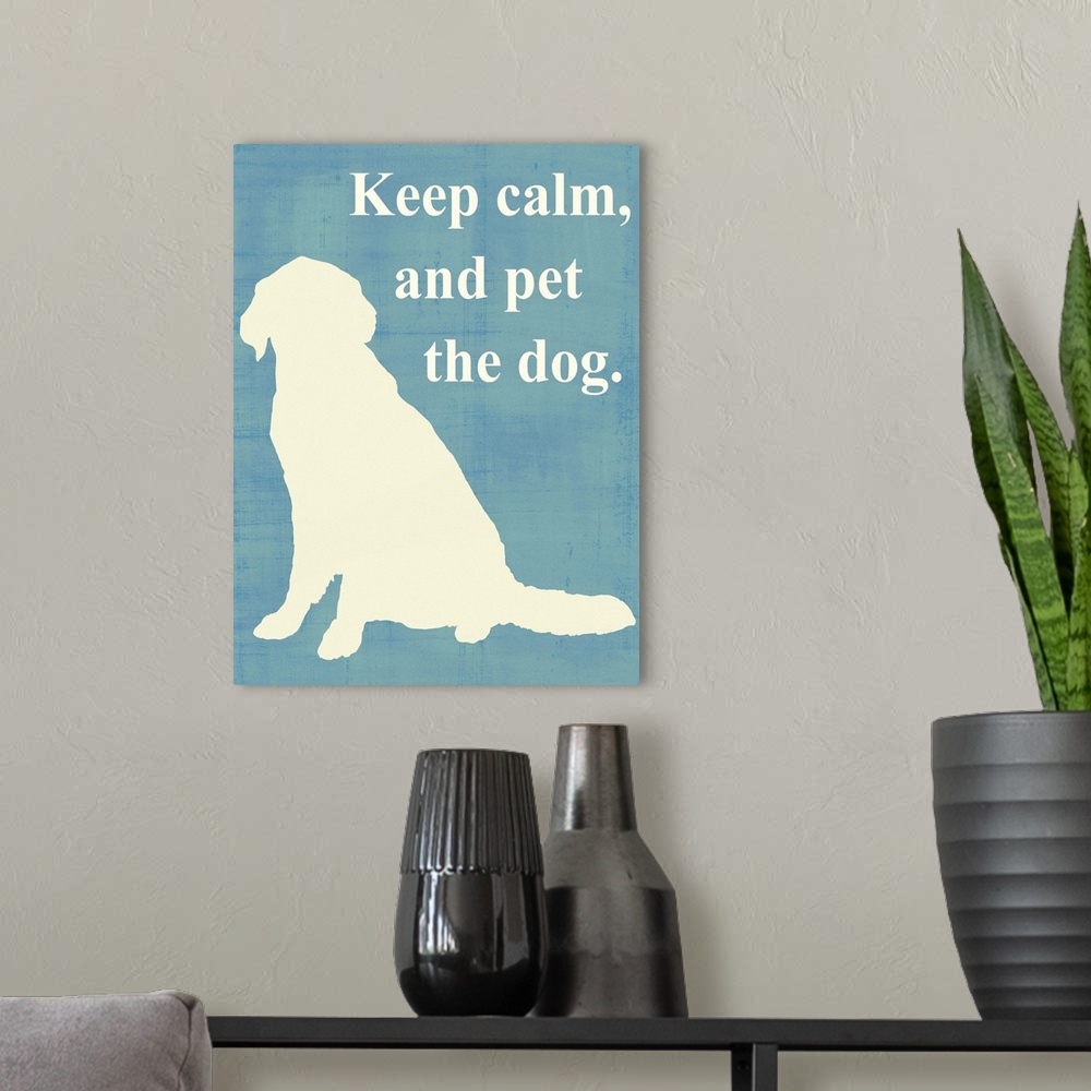 A modern room featuring Keep calm and pet the dog