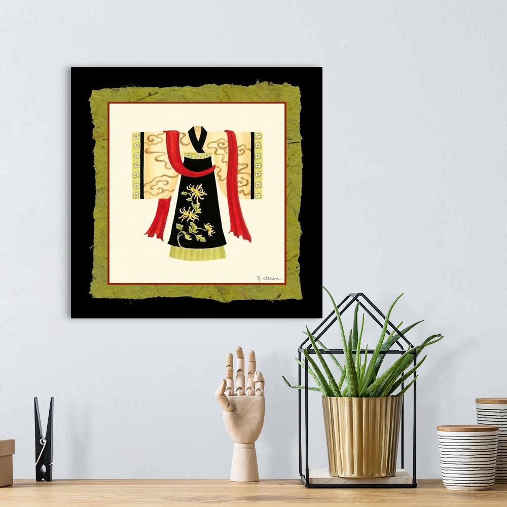 A bohemian room featuring Asian art design of a Kimono with a red sash on fabric matted background.