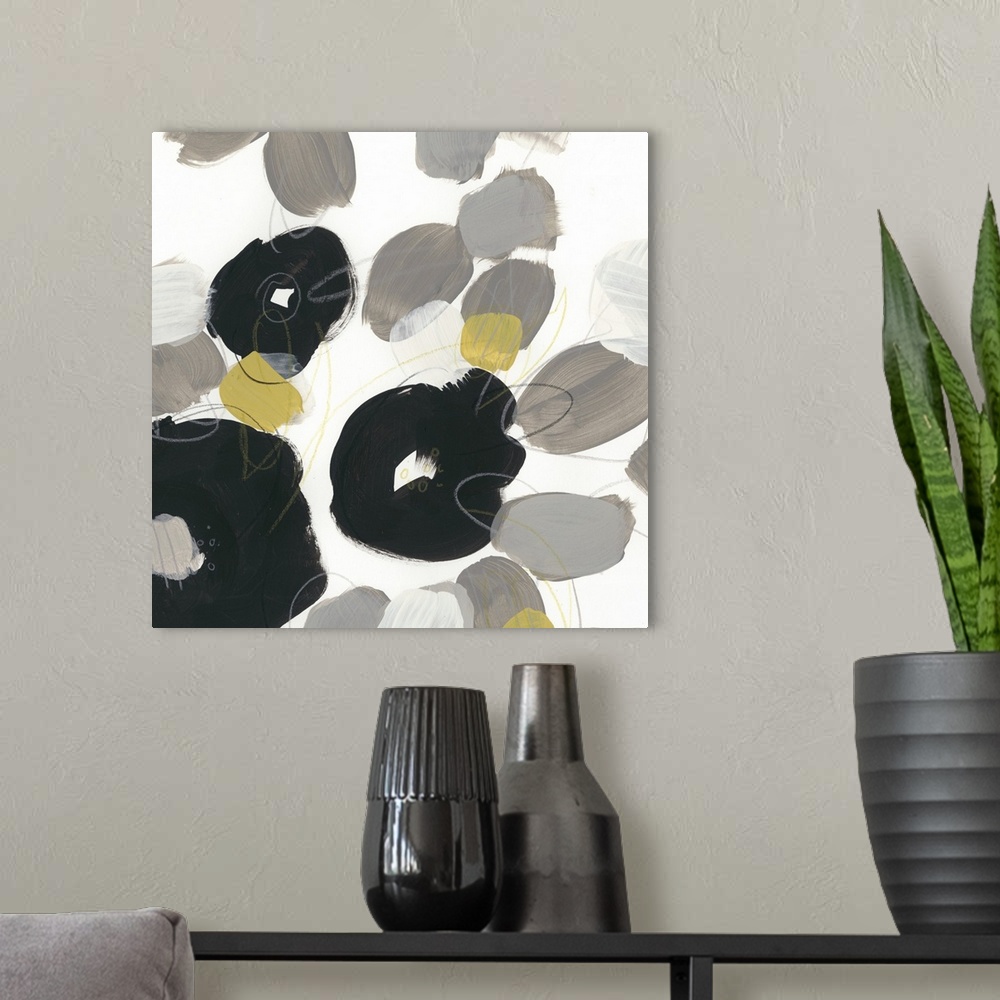 A modern room featuring Abstract floral painting with broad black shapes on white and grey.