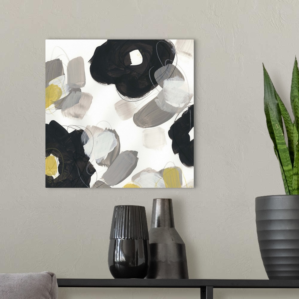 A modern room featuring Abstract floral painting with broad black shapes on white and grey.