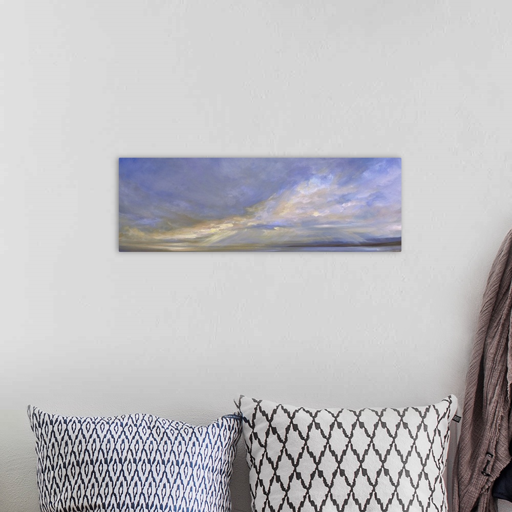 A bohemian room featuring Contemporary painting of pastel clouds over calm waters.