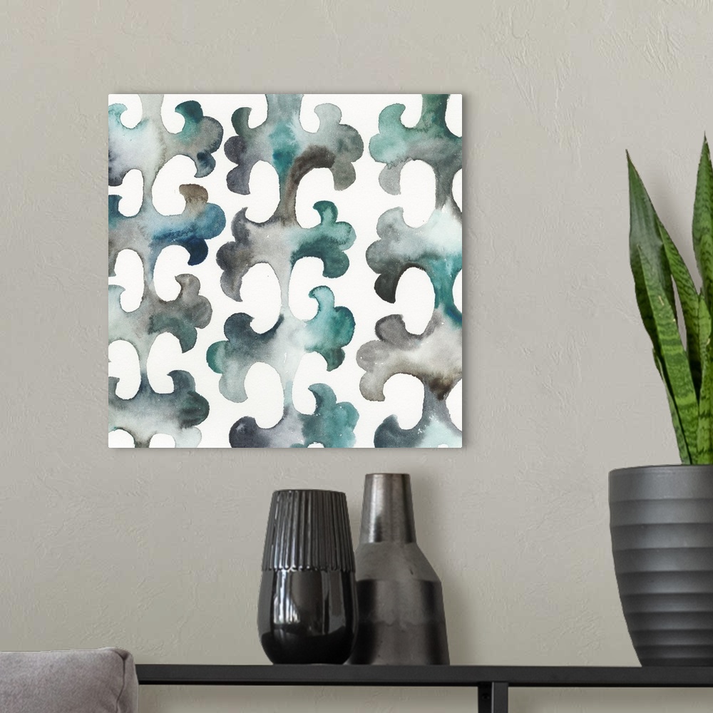 A modern room featuring Square abstract decor with a playful pattern made in shades of blue, green, and gray.