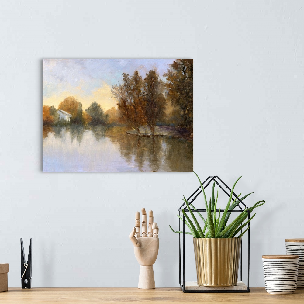 A bohemian room featuring Contemporary painting of a lake in a countryside scene in autumn.
