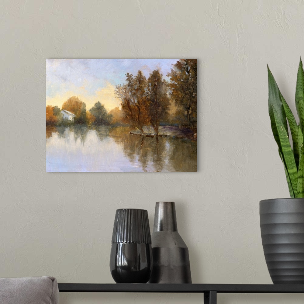 A modern room featuring Contemporary painting of a lake in a countryside scene in autumn.