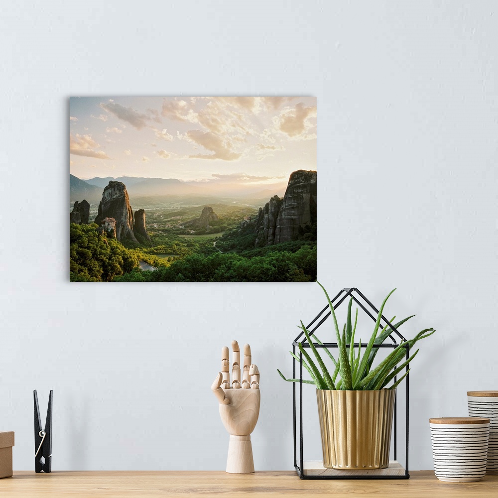 A bohemian room featuring Photograph of ancient monoliths in the landscape, Meteora, Greece.