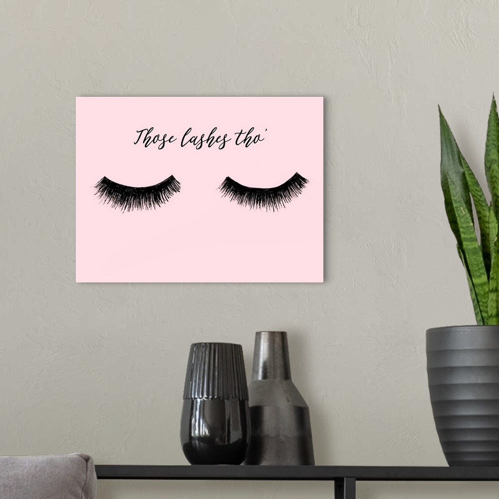 A modern room featuring "Those Lashes Tho" with eyelashes in black on a pink background.