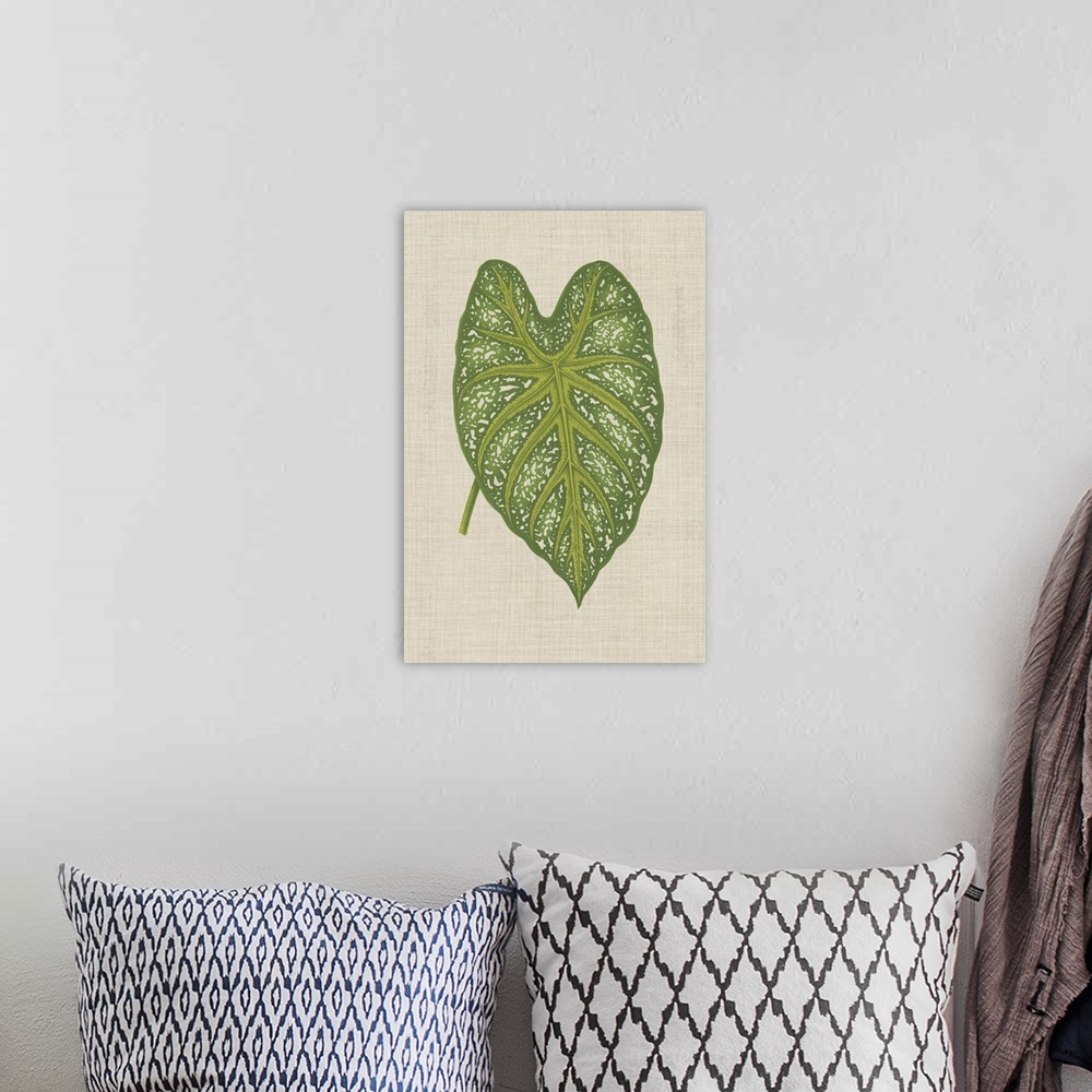 A bohemian room featuring This decorative artwork features an illustrative leaf with speckling detail over a neutral linen ...