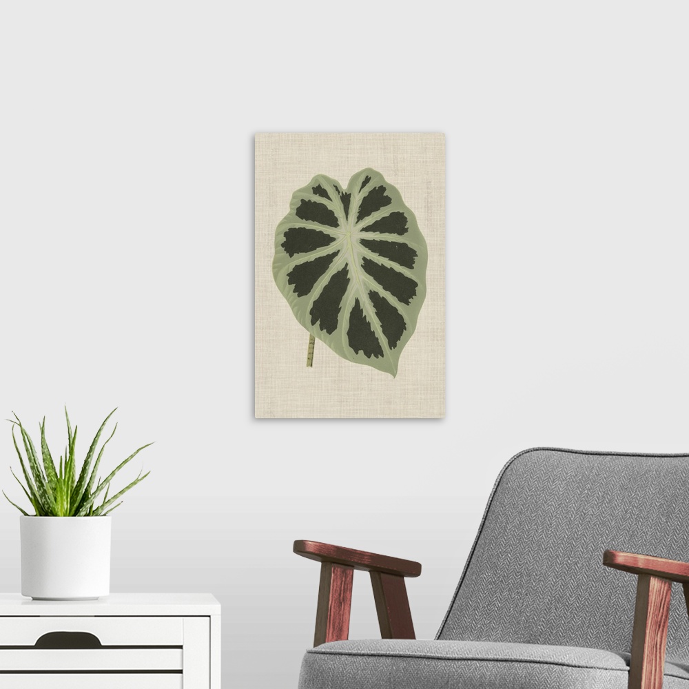 A modern room featuring This decorative artwork features an illustrative leaf with dark green spots over a neutral linen ...