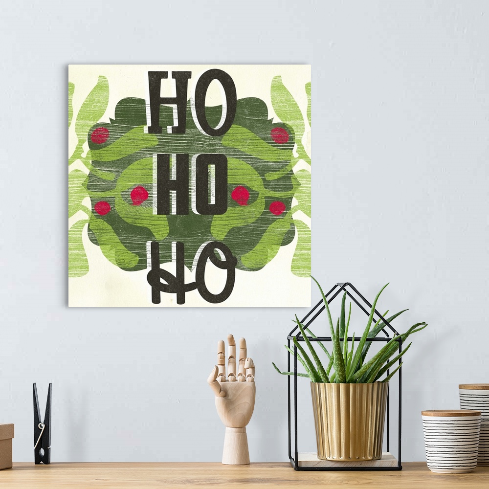 A bohemian room featuring "Ho Ho Ho" on a holly wreath against a cream backdrop and overlapping thin white lines that give ...