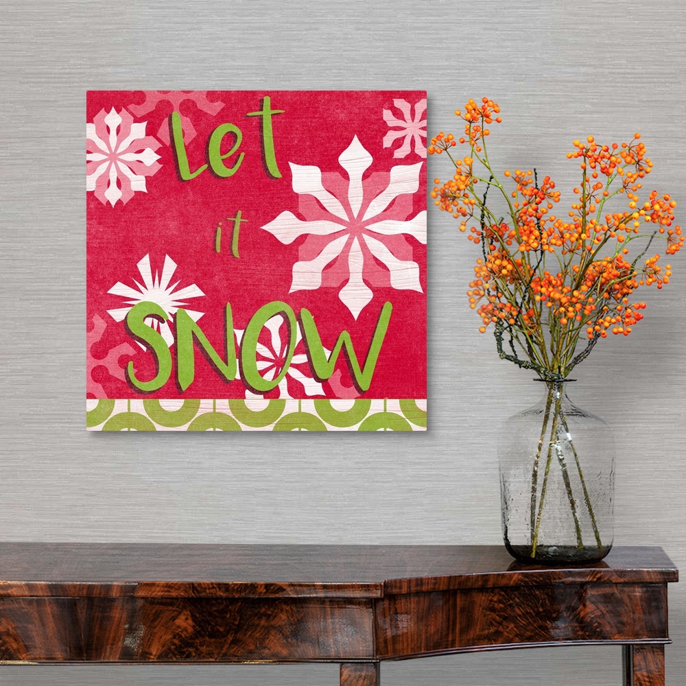 A traditional room featuring "Let it Snow" surrounded by snowflakes against a red backdrop and overlapping thin white lines th...